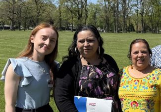 ESL instructor and participant An English as a Second Language instructor and participants at the May 2025 recognition program.