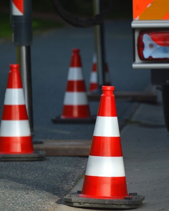 A photo of traffic cones on a road